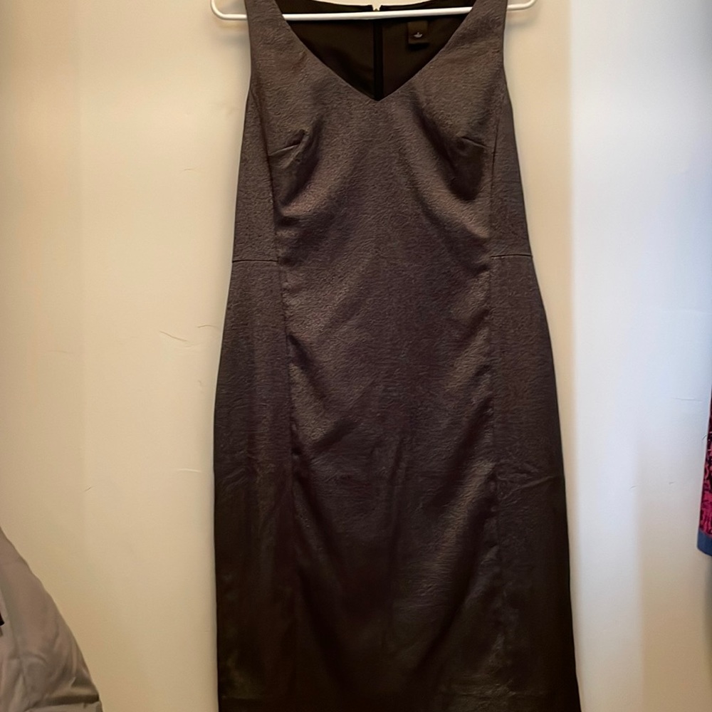 Dark gray sleeveless dress.